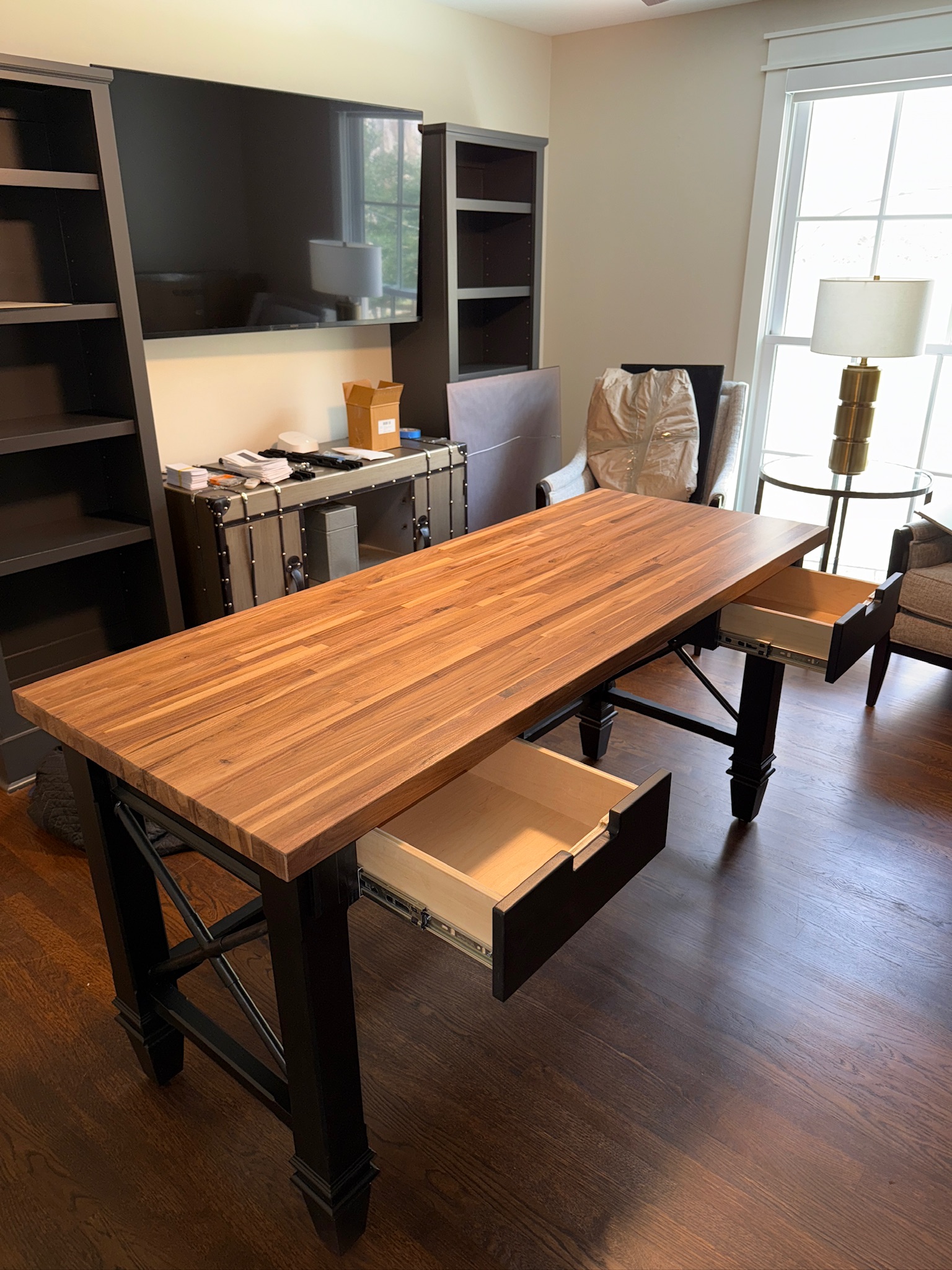 Home-office built-ins with a wood butcher-block desk
