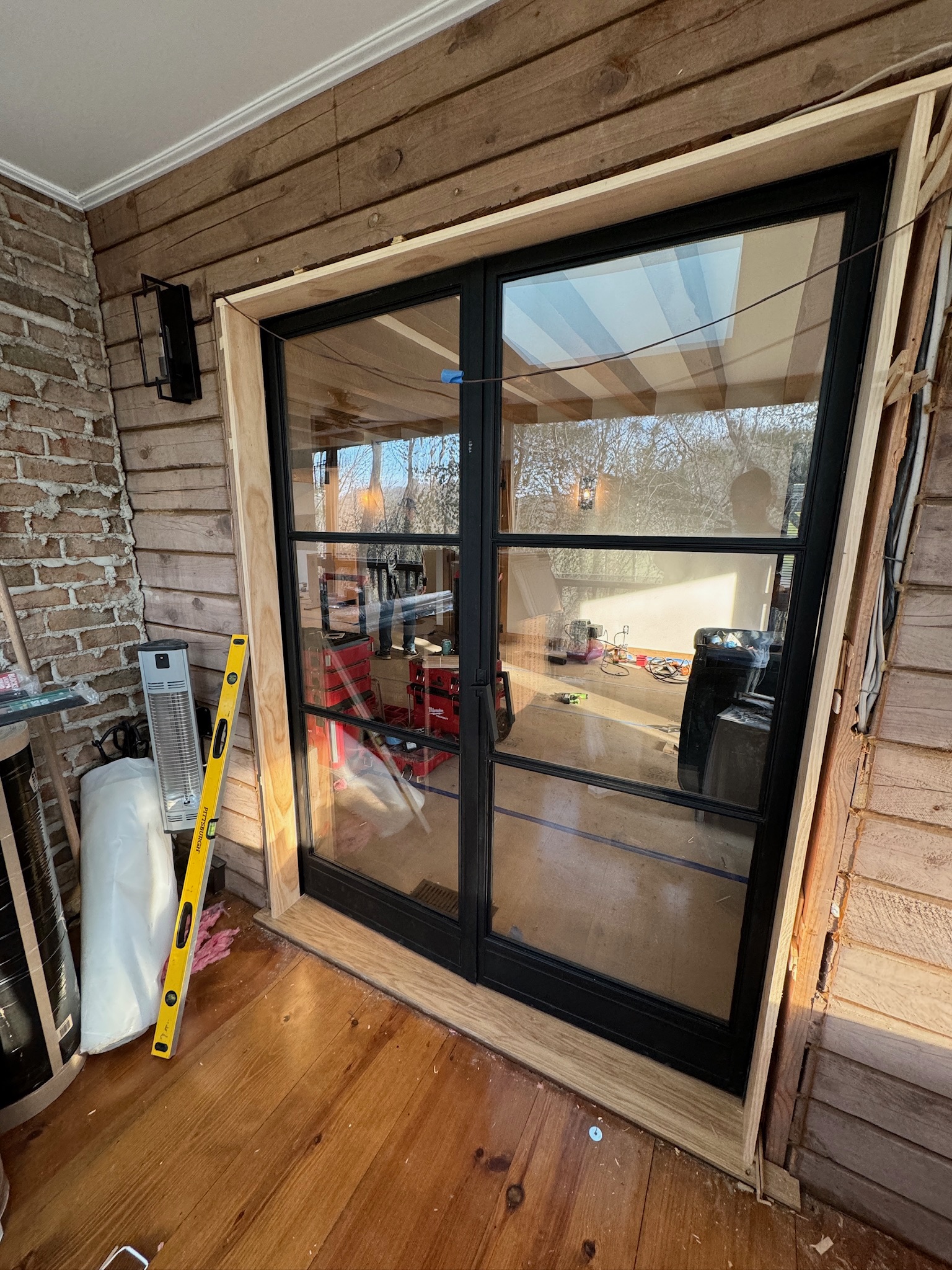 Black steel-framed glass doors in a home