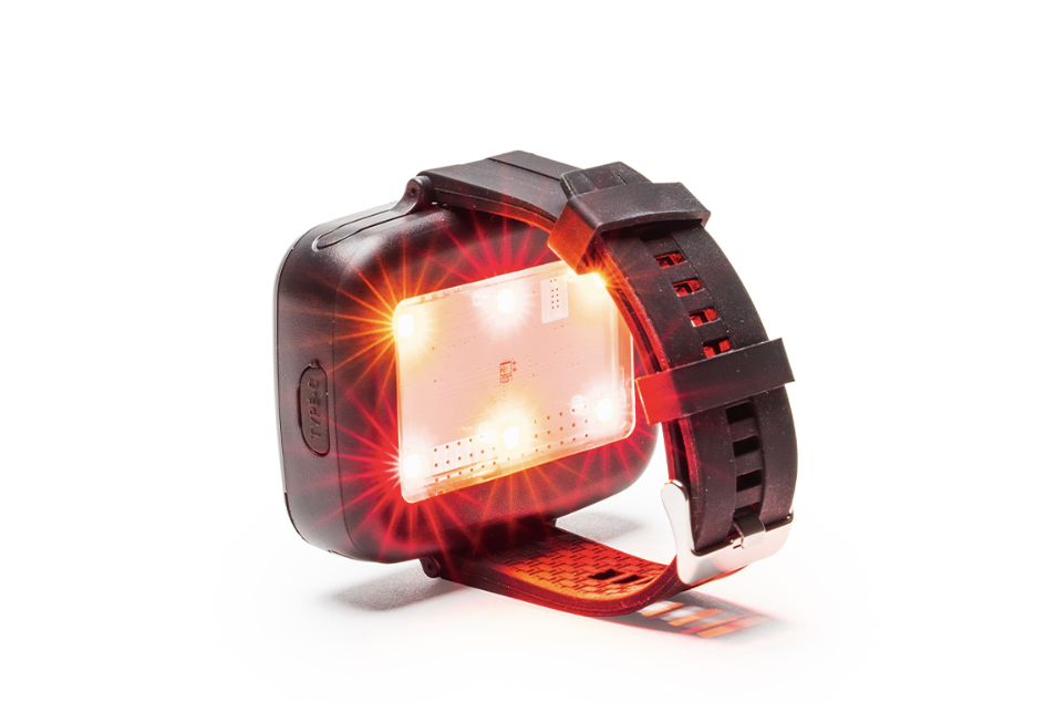 Solex 660 Band red light wrist device with red LEDs glowing