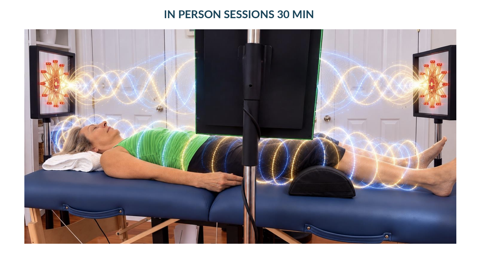 A client resting on the table between two scalar-wave light panels during an in-person session